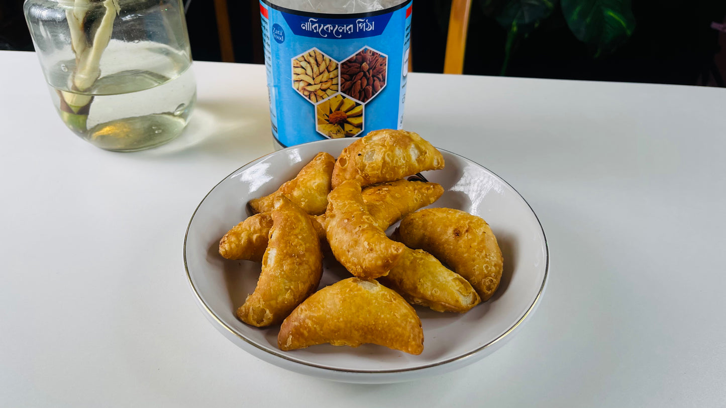 নারিকেল পুলি পিঠা 500 gm